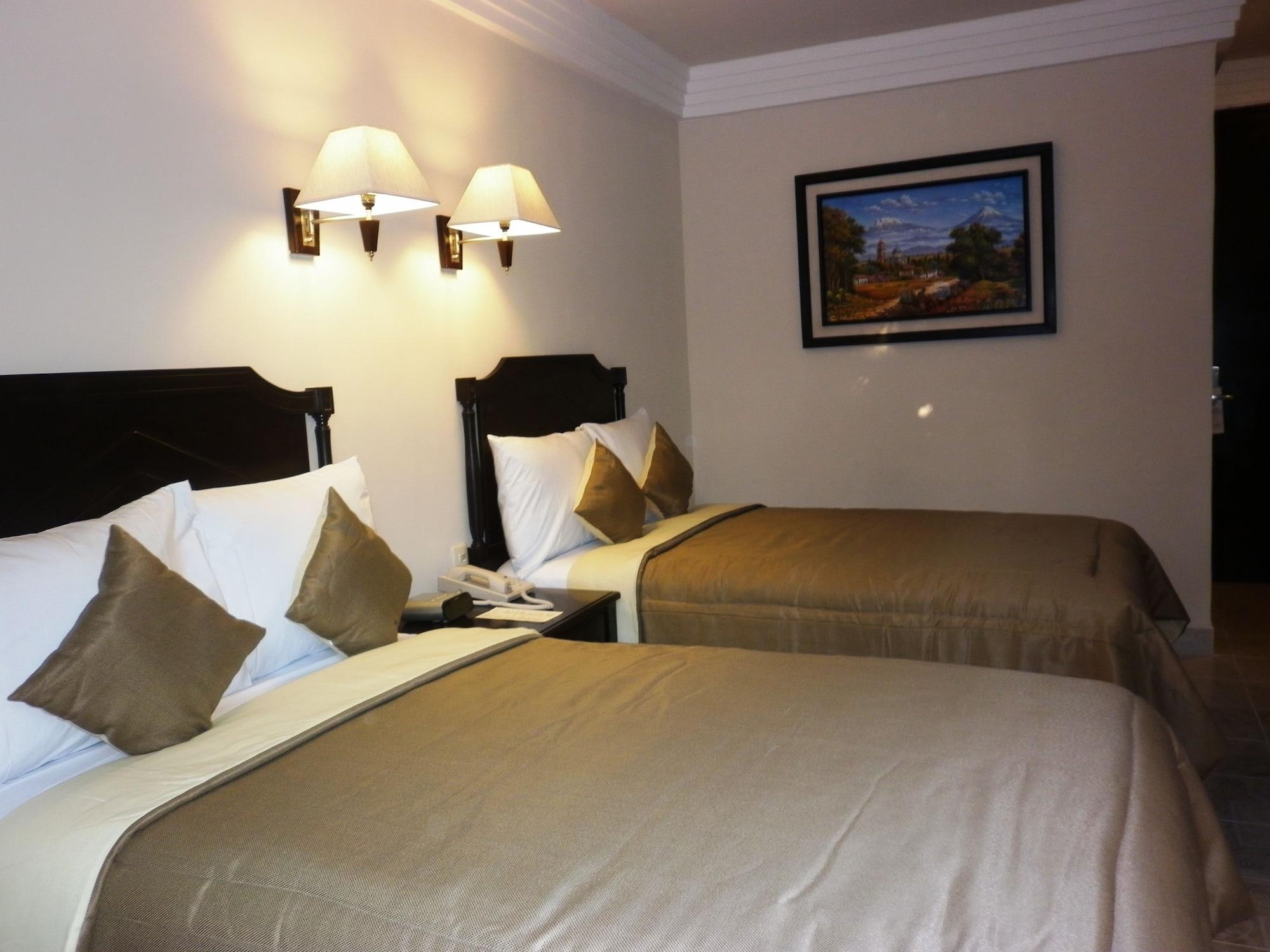 Hotel Victoria Merida Exterior photo A room at the hotel