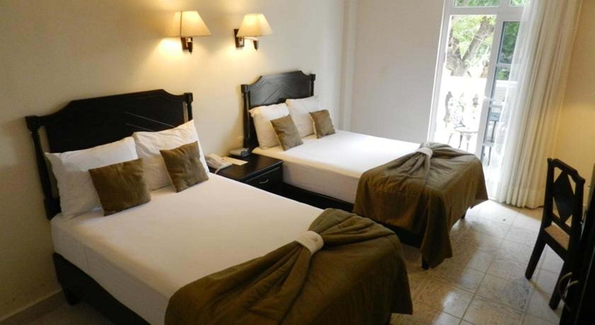 Hotel Victoria Merida Exterior photo A room at the hotel