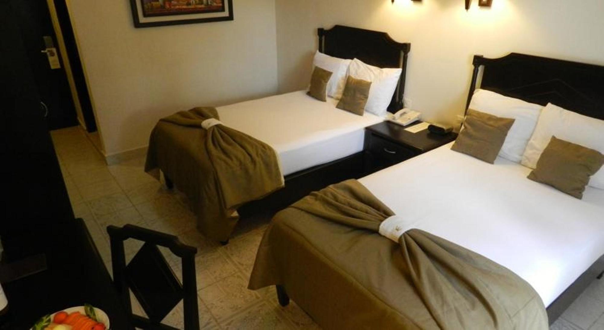Hotel Victoria Merida Exterior photo A room at the hotel