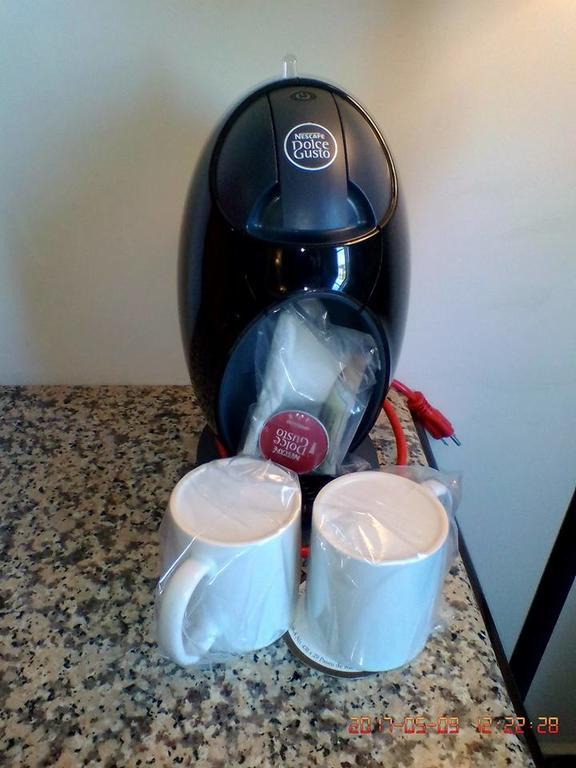 Hotel Victoria Merida Exterior photo A coffee machine
