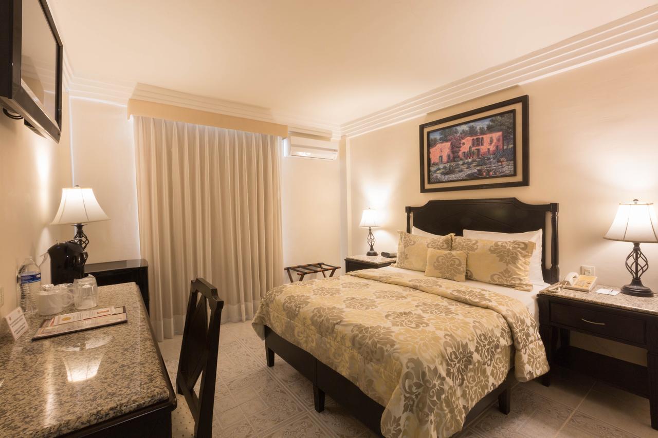 Hotel Victoria Merida Exterior photo A room at the hotel