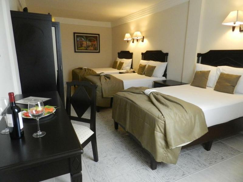 Hotel Victoria Merida Exterior photo A room at the hotel